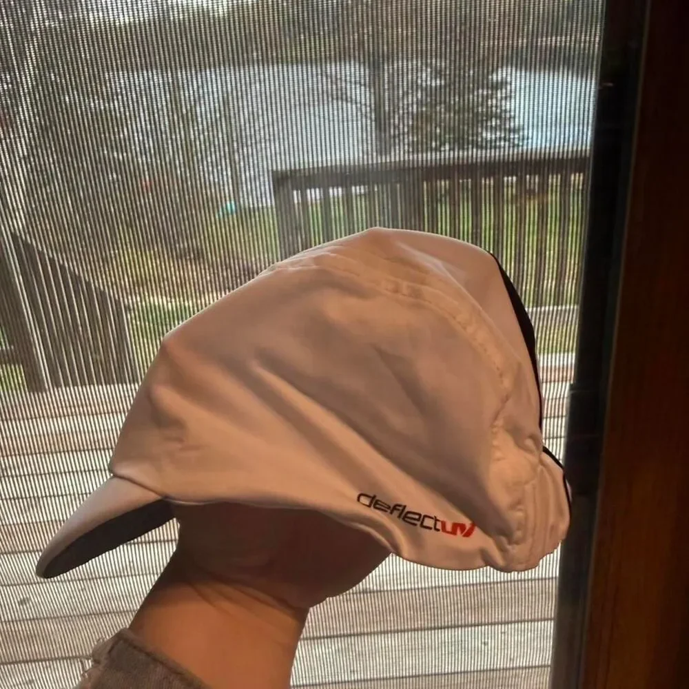Baby sun hat that looks like a baseball cap.